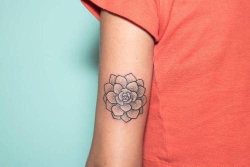 Tattoo tagged with: flower, small, black, tricep, tiny, hand poked, little,  nature, medium size, hindu, religious, nano, lotus flower 