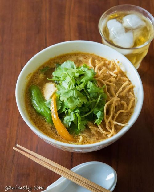 ganimaly:
“ Khao Soi for lunch of another rainy Monday.
This norther Thai noodle dish is really great with egg noodle topped with deep fried noodle. Red curry with coconut milk, and Indian curry powder, which was said brought there from Myanmar. Love...
