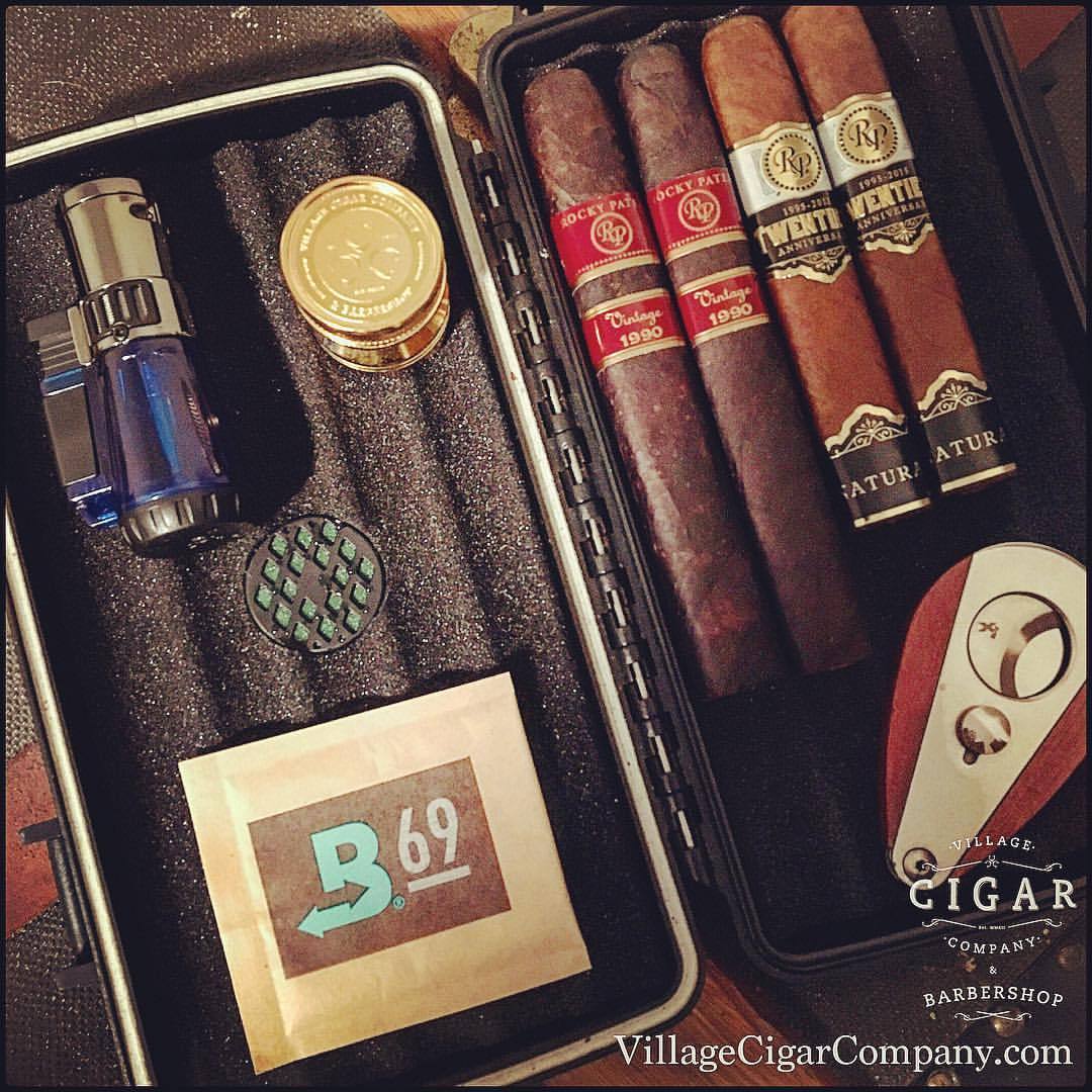 Traveling soon? Take us with you!!
Before you go, be sure to stop by one of our shops and pick up a travel humidor packed full of our “Cigar Of The Month” features from Rocky Patel cigars!
Village Cigar Company
& Barbershop
Burlington &...