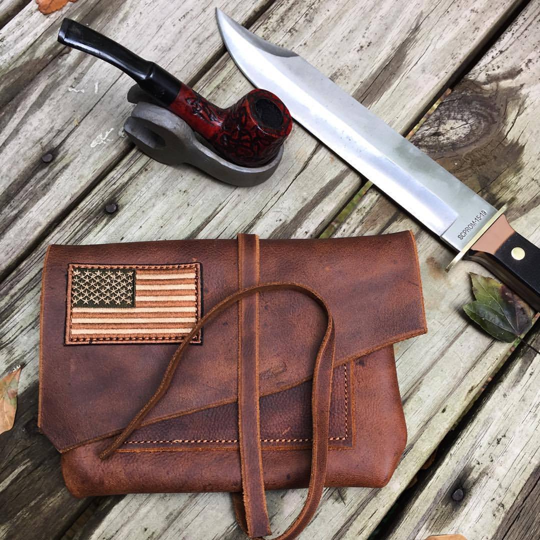 Rugged, thick premium leather tobacco pipe pouch with subdued flag patch shipping today. #ruggedluxury #madeinusa ⚒⚒⚒ #veteranmade #tobaccopipe #pipetobacco #nowsmoking #iamtpc Cool pipe stand by @timcanny www.LegendarySaxon.com