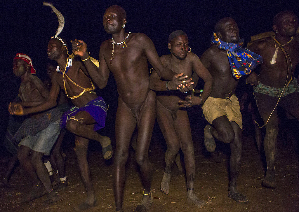 Bodi Tribe Men Celebrating The Kael, Hana Mursi, Omo Valley, Ethiopia, by Eric Lafforgue.