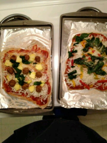 David and I made homemade vegetarian pizza last night! He made one, and I made one. Admittedly, his came out tastier.
Dough: c/o Trader Joes whole wheat pizza dough
Pizza on the left:
-Tomato basil sauce, pineapple pieces, meatless meatballs,...